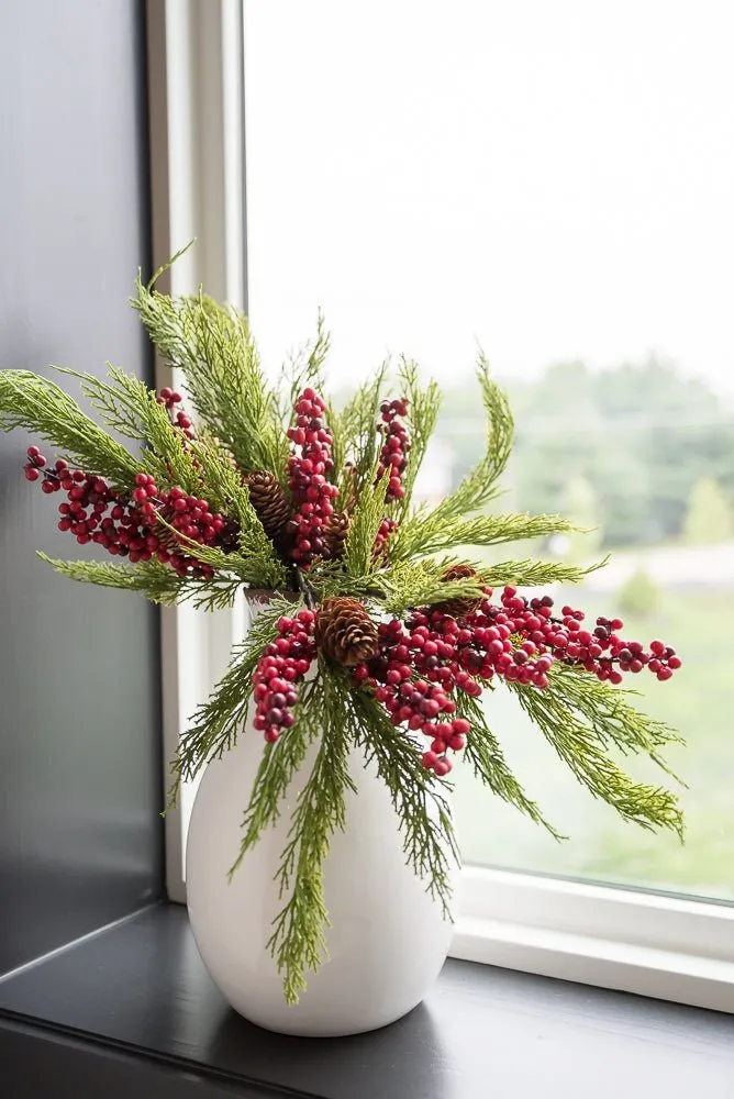 Artificial cedar and red berries branch